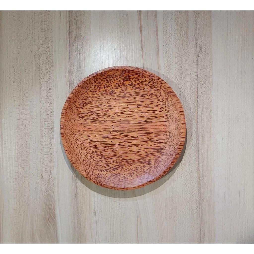 Coconut wood plate for jam, seeds, fruit, salad